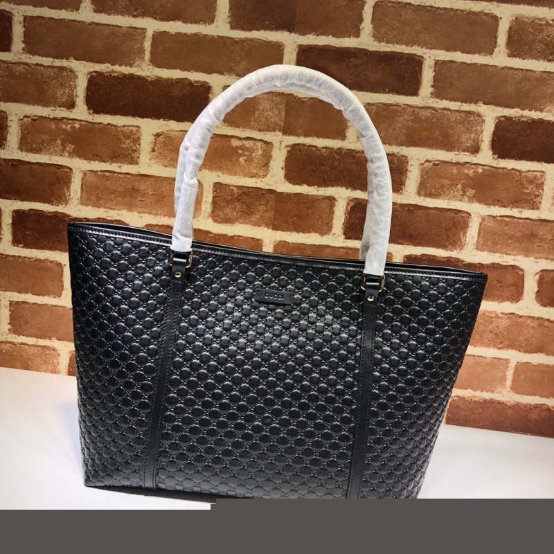 G*u*i shopping bags